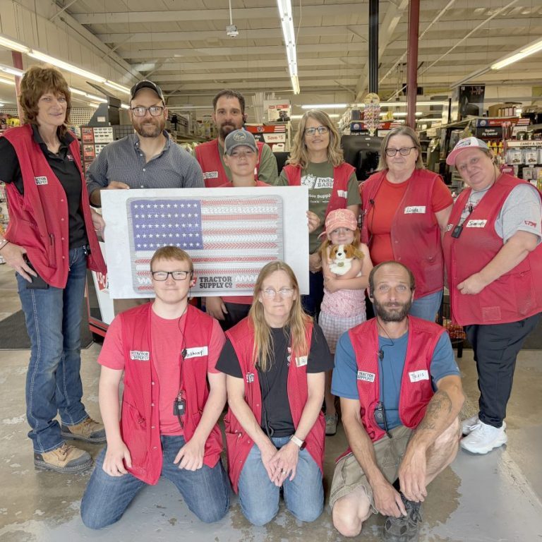 The Shelbina Tractor Supply presented a $1,000 gift card to local veteran Isaac Rodriguez. Front row, from the left: Anthony Strachan, Andi Strachan and Travis Garrett, Assistant Manager. Back row, from the left: Bert Klassen, manager, Rodriguez with his kids, Malachi and Eleanor, Donnie Forgle, Carole Wharton, Linda Moore and Samantha Barnett. Photograph by Mark Requet