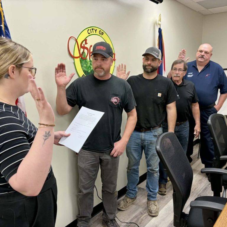 City Clerk Jordan Mahaffey swore in newly elected council members and the City Marshal on Tuesday, April 14, 2026. From the left: Mahaffey, Alderman Chad Wharton, Alderman Nick Broughton, Mayor Al Dimmitt and City Marshal Jeff Brown. Photograph Mark Requet